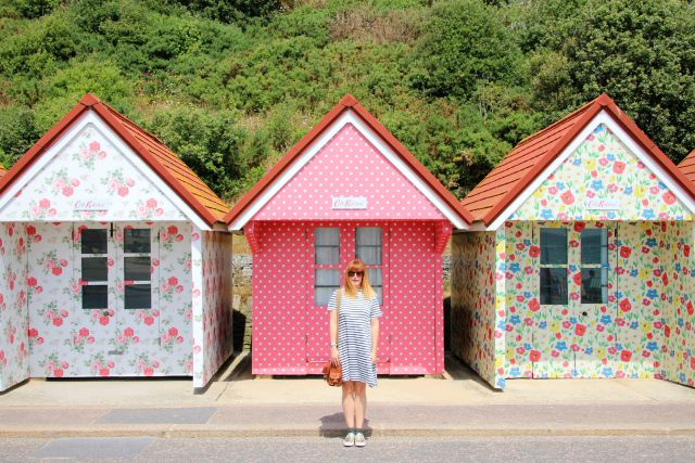 Posing by the Cath Kidston beach huts